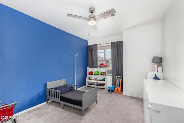 carpeted bedroom featuring ceiling fan