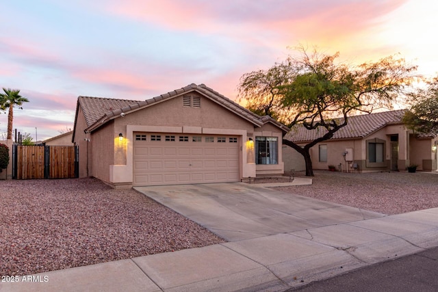 view of front of property featuring a garage