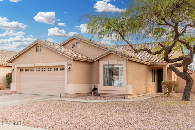 view of front of property with a garage