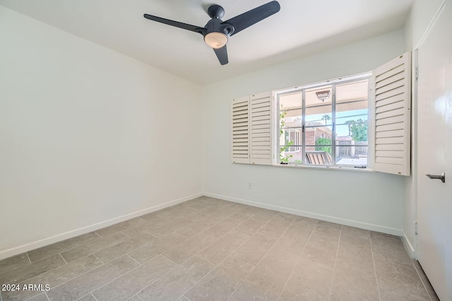 empty room featuring ceiling fan