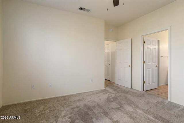 unfurnished bedroom with light carpet