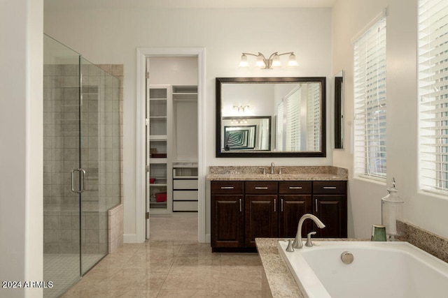 bathroom featuring plus walk in shower and vanity