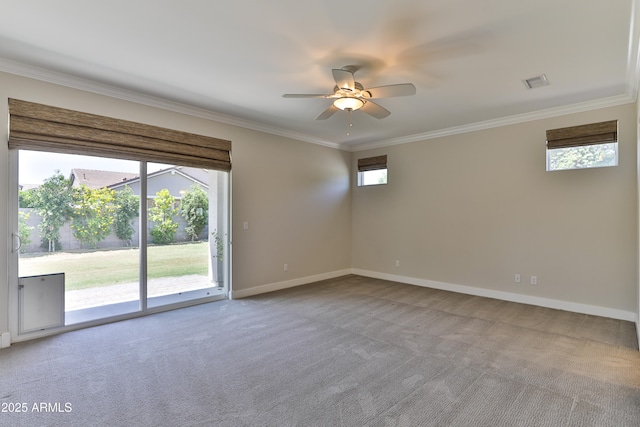 1505 W Orangewood Ave W, Phoenix, AZ 85021 - carpeted empty room featuring ornamental molding, a ceiling fan, and plenty of natural light