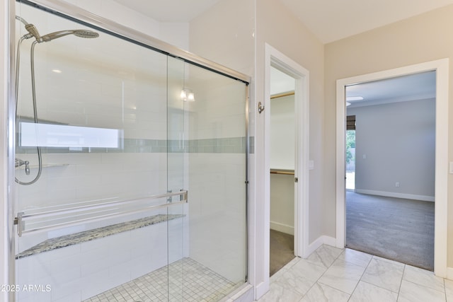 1505 W Orangewood Ave W, Phoenix, AZ 85021 - bathroom featuring a shower stall and marble finish flooring