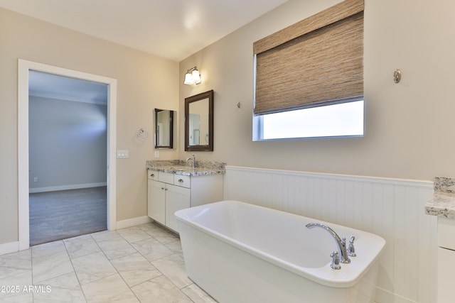 1505 W Orangewood Ave W, Phoenix, AZ 85021 - full bathroom with vanity, a soaking tub, marble finish floors, and wainscoting