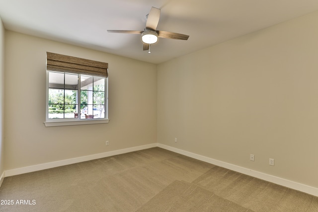 1505 W Orangewood Ave W, Phoenix, AZ 85021 - carpeted spare room featuring baseboards and ceiling fan