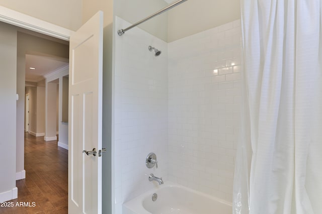 1505 W Orangewood Ave W, Phoenix, AZ 85021 - bathroom featuring shower / bath combo and wood finished floors