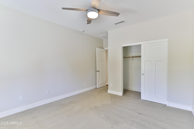 1505 W Orangewood Ave W, Phoenix, AZ 85021 - unfurnished bedroom featuring light carpet, a closet, and a ceiling fan