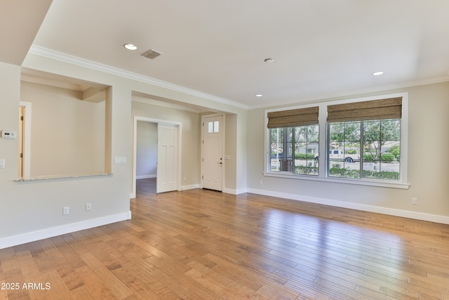 1505 W Orangewood Ave W, Phoenix, AZ 85021 - unfurnished living room featuring crown molding, wood finished floors, and recessed lighting