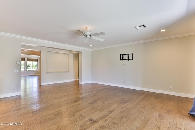 1505 W Orangewood Ave W, Phoenix, AZ 85021 - spare room with ceiling fan, light wood-type flooring, crown molding, and recessed lighting