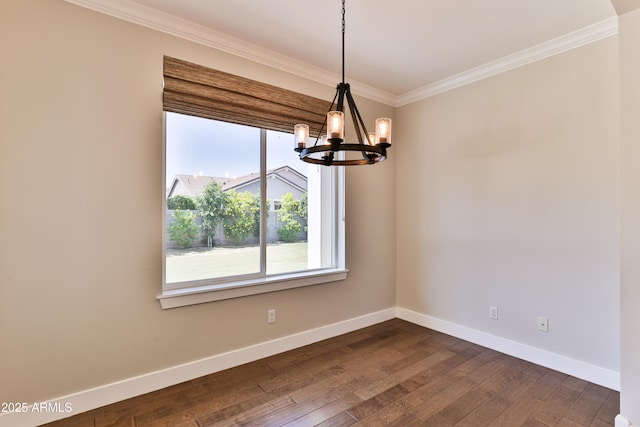 1505 W Orangewood Ave W, Phoenix, AZ 85021 - spare room with a chandelier, crown molding, and dark wood finished floors