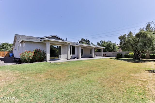 1505 W Orangewood Ave W, Phoenix, AZ 85021 - rear view of property with a patio area and stucco siding