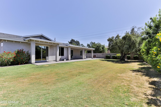 1505 W Orangewood Ave W, Phoenix, AZ 85021 - back of house featuring a patio area, stucco siding, and a fenced backyard