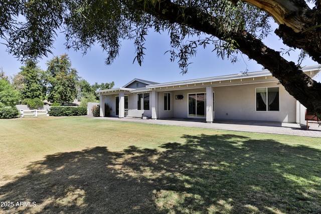 1505 W Orangewood Ave W, Phoenix, AZ 85021 - back of house featuring stucco siding and a patio area