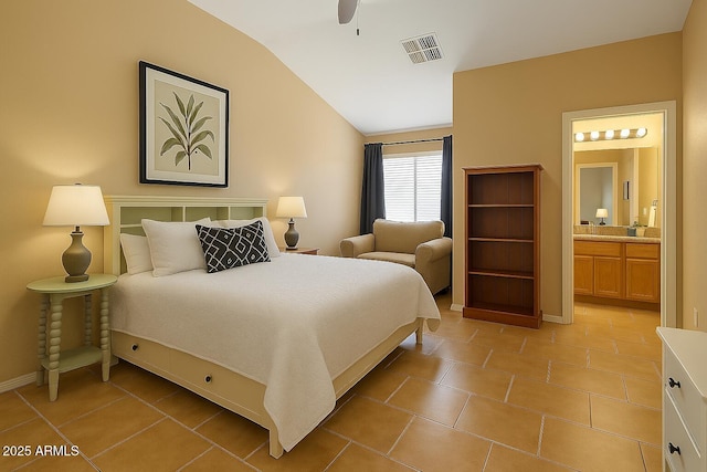 6610 E University Dr Unit 127, Mesa, AZ 85205 - bedroom with lofted ceiling, ensuite bath, light tile patterned floors, and a ceiling fan