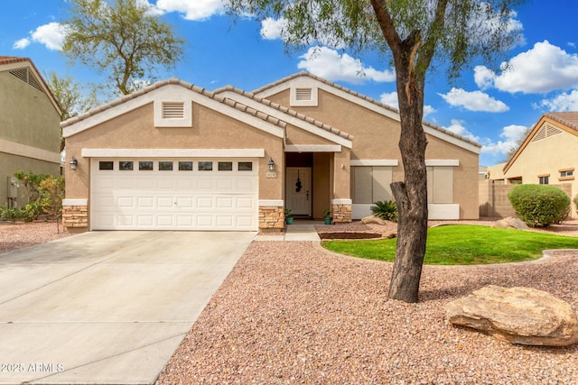 ranch-style house featuring concrete driveway, an attached garage, stone siding, and stucco siding