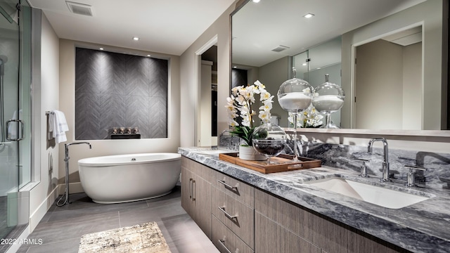 bathroom with tile flooring and dual bowl vanity