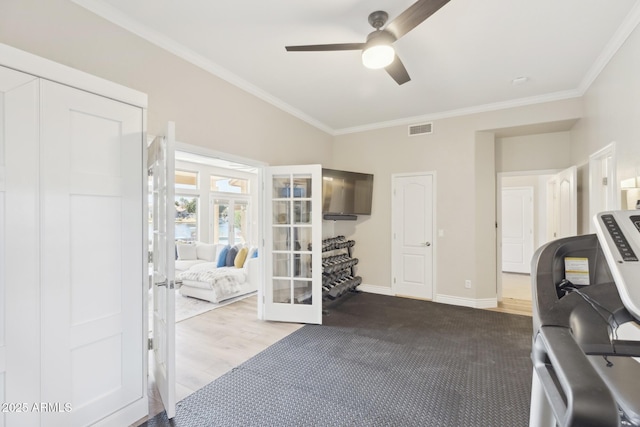 exercise area featuring baseboards, visible vents, ceiling fan, ornamental molding, and french doors