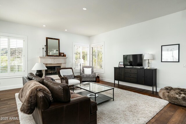 6556 N Arizona Biltmore Cir, Phoenix, AZ 85016 - living room with dark wood-style floors, baseboards, a premium fireplace, and recessed lighting