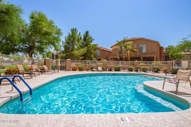 view of pool featuring a patio