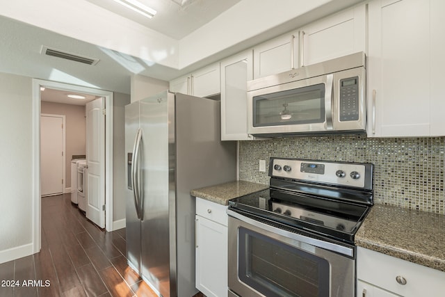 kitchen featuring white cabinets, dark hardwood / wood-style floors, appliances with stainless steel finishes, and tasteful backsplash