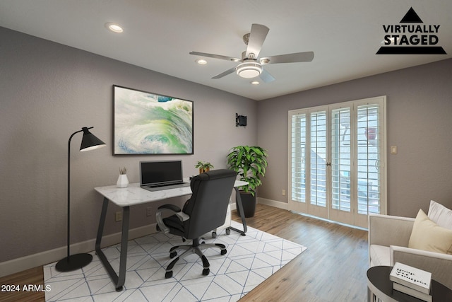 office space featuring hardwood / wood-style flooring and ceiling fan