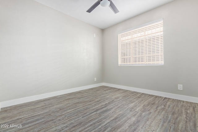 unfurnished room featuring wood-type flooring and ceiling fan