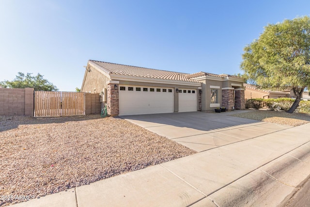 view of front of property with a garage