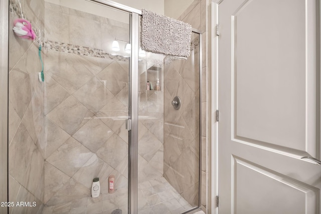 bathroom featuring an enclosed shower