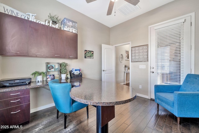 office area featuring ceiling fan and dark hardwood / wood-style floors