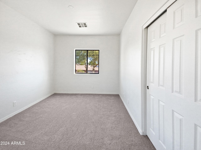 view of carpeted spare room