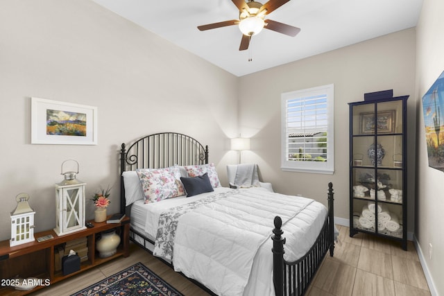 20795 W San Juan Ave, Buckeye, AZ 85396 - bedroom with baseboards and ceiling fan
