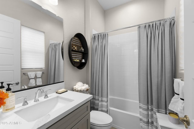 20795 W San Juan Ave, Buckeye, AZ 85396 - bathroom featuring vanity, shower / bath combo with shower curtain, and toilet