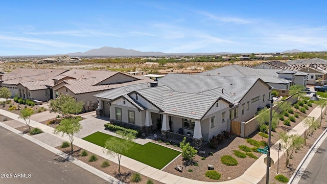 20795 W San Juan Ave, Buckeye, AZ 85396 - aerial view of residential area featuring a mountain backdrop