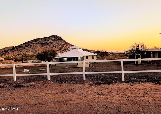 yard at dusk with a mountain view