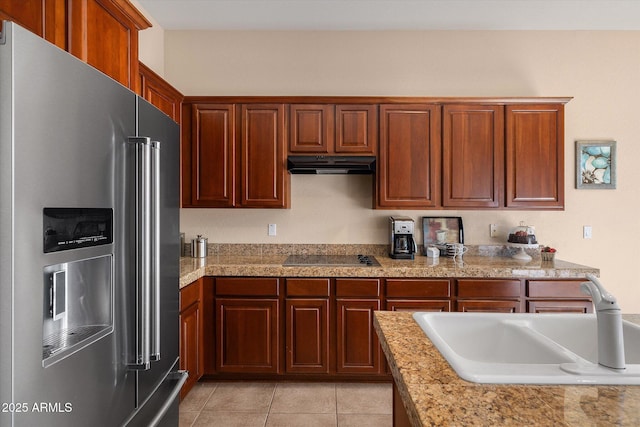 7445 E Eagle Crest Dr Unit 1015, Mesa, AZ 85207 - kitchen featuring high end fridge, a sink, under cabinet range hood, light countertops, and black electric stovetop