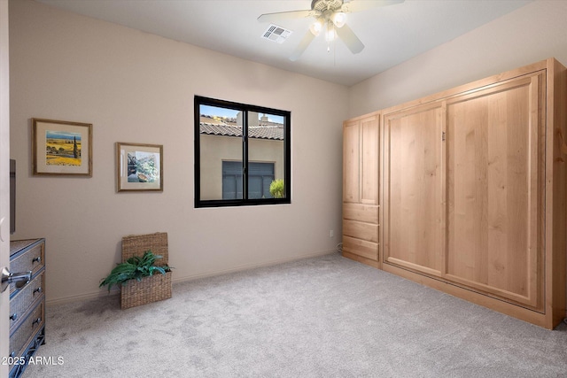 7445 E Eagle Crest Dr Unit 1015, Mesa, AZ 85207 - unfurnished bedroom with carpet, a ceiling fan, and baseboards
