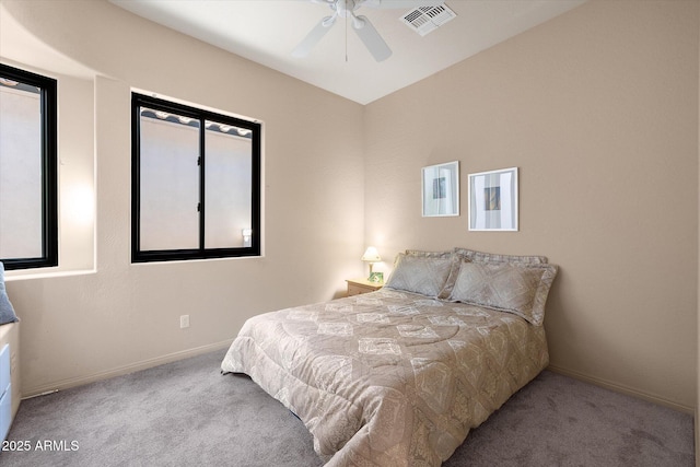 7445 E Eagle Crest Dr Unit 1015, Mesa, AZ 85207 - carpeted bedroom featuring baseboards and a ceiling fan