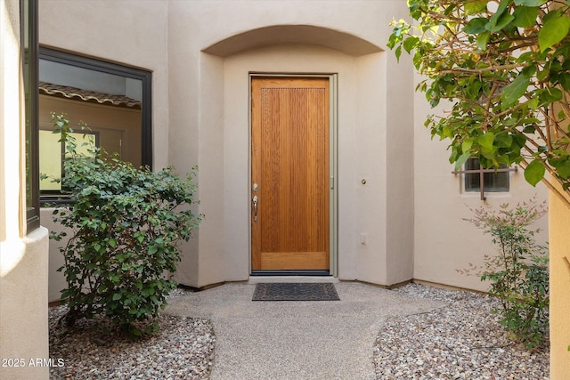 7445 E Eagle Crest Dr Unit 1015, Mesa, AZ 85207 - doorway to property featuring stucco siding