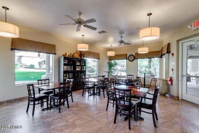 7445 E Eagle Crest Dr Unit 1015, Mesa, AZ 85207 - dining space featuring ceiling fan