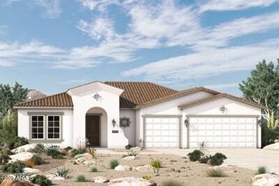 mediterranean / spanish-style home featuring a garage