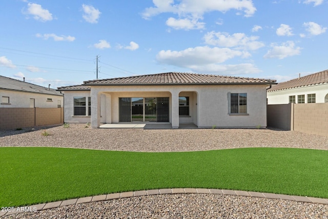 12316 W Parkway Ln, Avondale, AZ 85323 - back of property featuring a tile roof, stucco siding, and a patio area