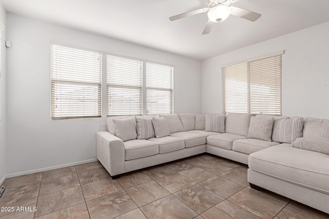 living room with ceiling fan