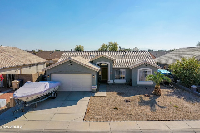 view of front of property with a garage