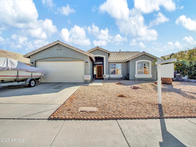 view of front of property with a garage