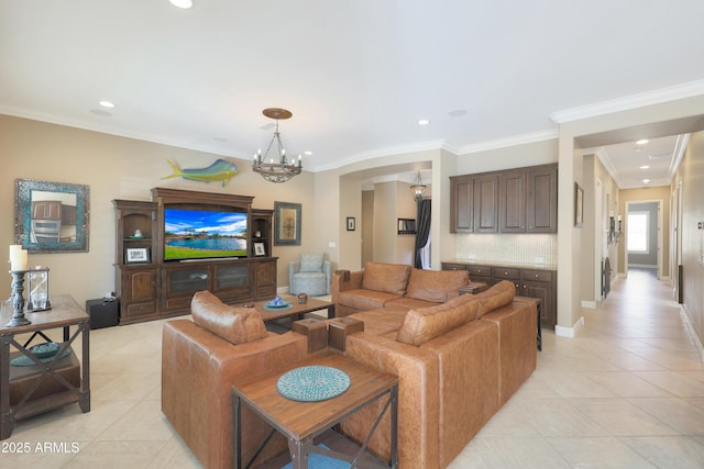 living room featuring ornamental molding, recessed lighting, an inviting chandelier, and light tile patterned floors