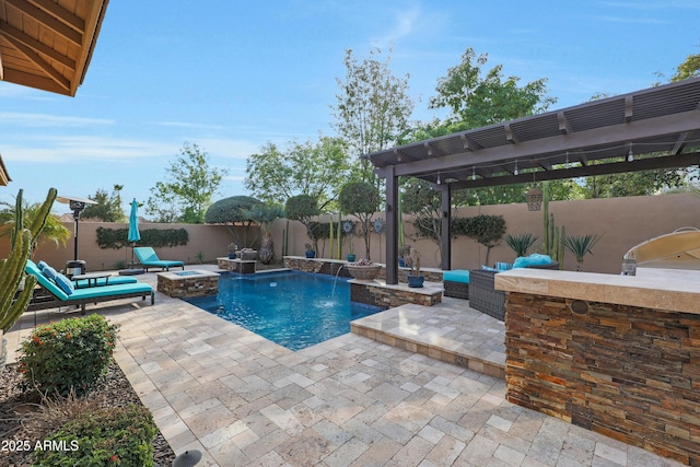 view of swimming pool with a patio area, a fenced backyard, and a bar