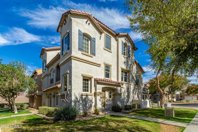 exterior space with a front yard