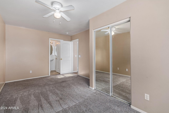 unfurnished bedroom with ceiling fan, carpet floors, and a closet