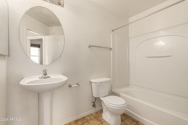 full bathroom with sink, shower / bathtub combination, and toilet